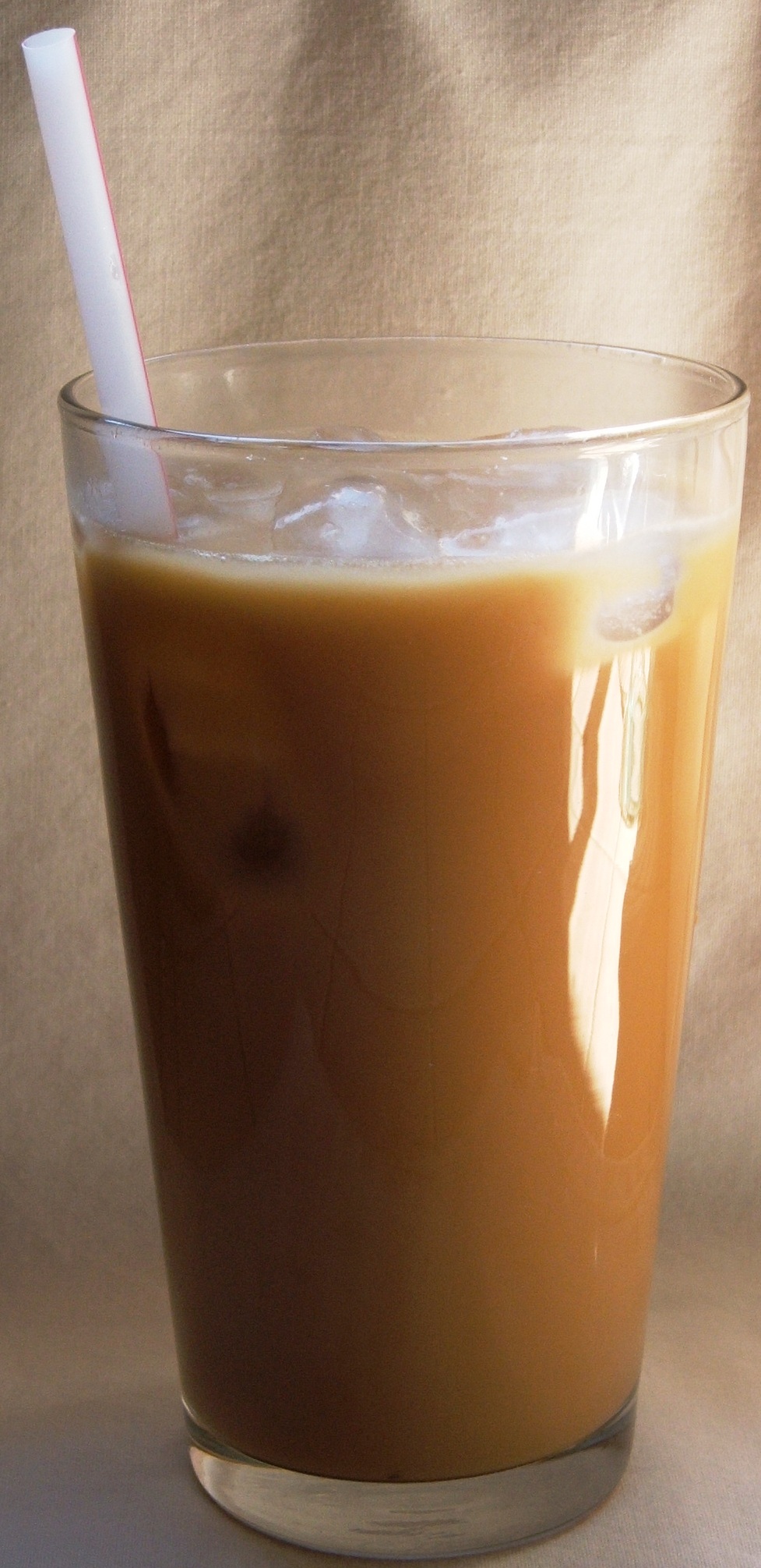 pouring milk into espresso latte heart shape barista hands