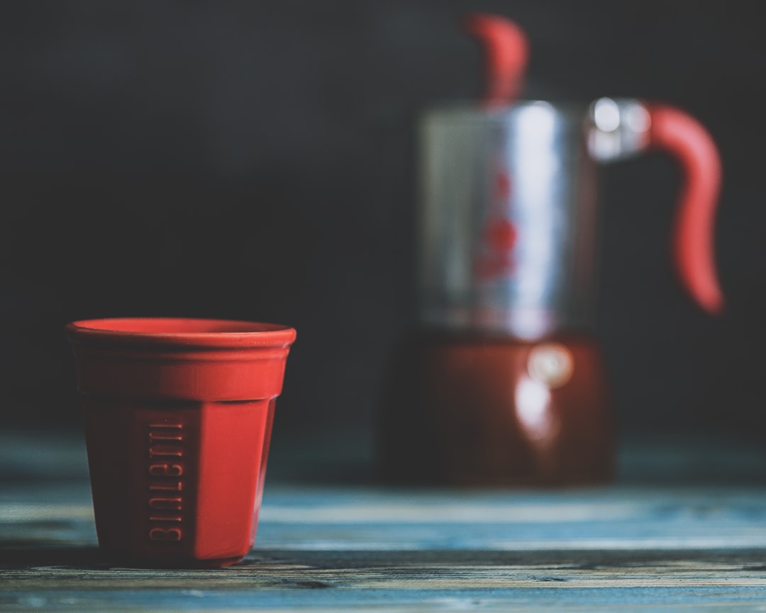 Puerto Rican cortadito small espresso with milk served in traditional cup