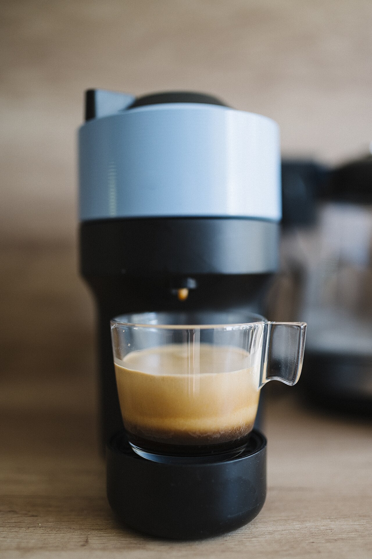 traditional wooden coffee processing barn in mountain region, stacks of burlap coffee sacks, warm morning light