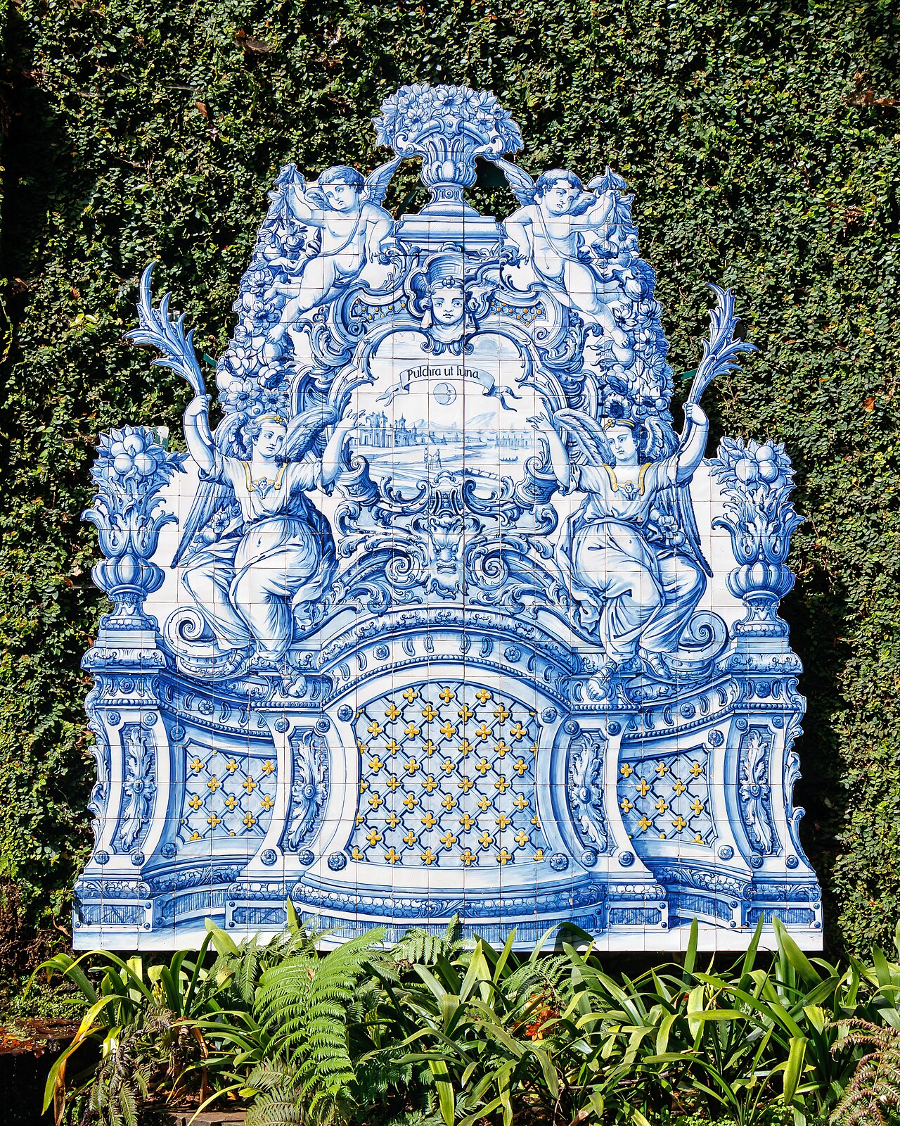 Historic stone buildings of Hacienda Lealtad in Lares Puerto Rico with tropical gardens (Wikimedia: Monte Palace Tropical Garden - Azulejo 02.jpg, CC BY-SA 3.0)