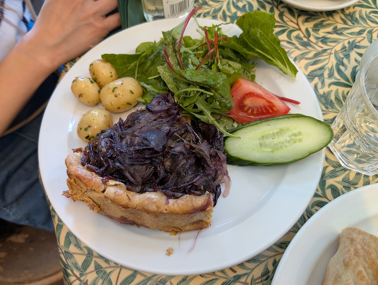 Perfect Puerto Rican flan de café inverted on a plate, rich caramel sauce dripping down the sides, coffee-colored custard, elegant presentation