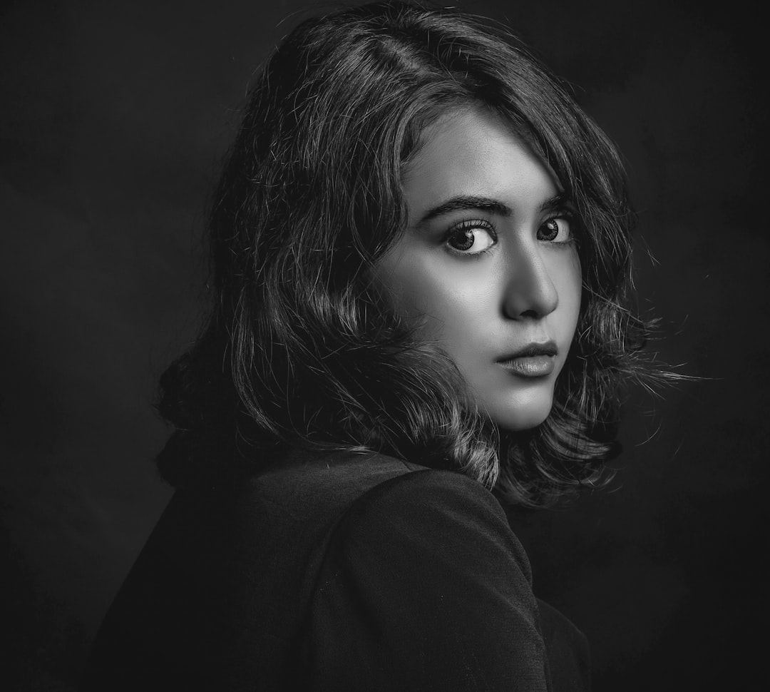 portrait-style image of Roberto Atienza working at the Hacienda San Pedro farm, hands holding fresh coffee cherries, warm afternoon light