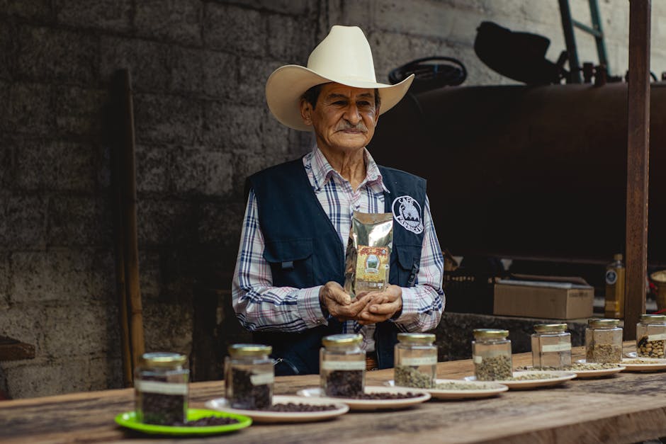 Orocovis coffee farmer carefully hand-harvesting cherries on steep mountain terrain