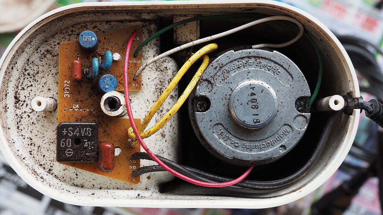 modern electric coffee grinder on cafe counter professional