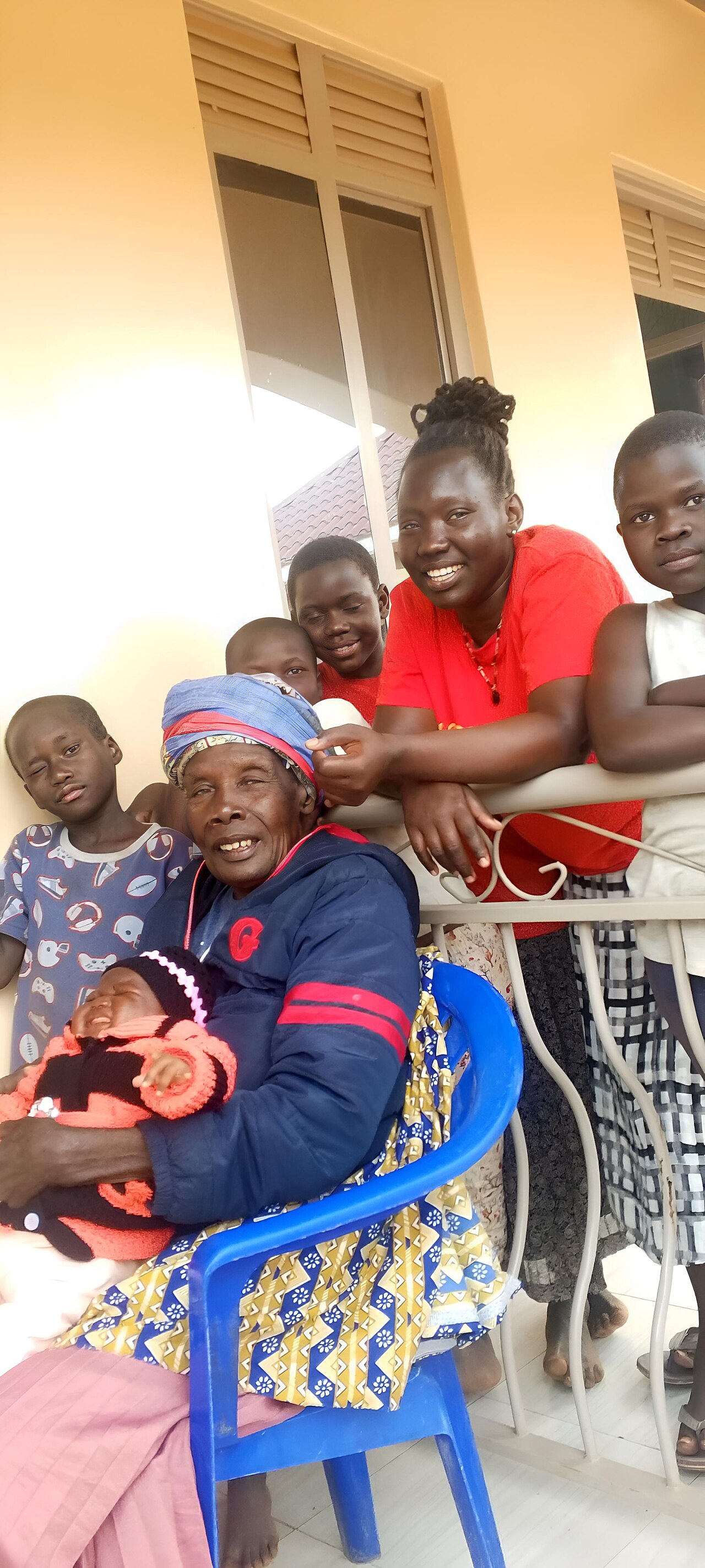 Multi-generational Puerto Rican diaspora family sharing coffee at a family gathering in their mainland home