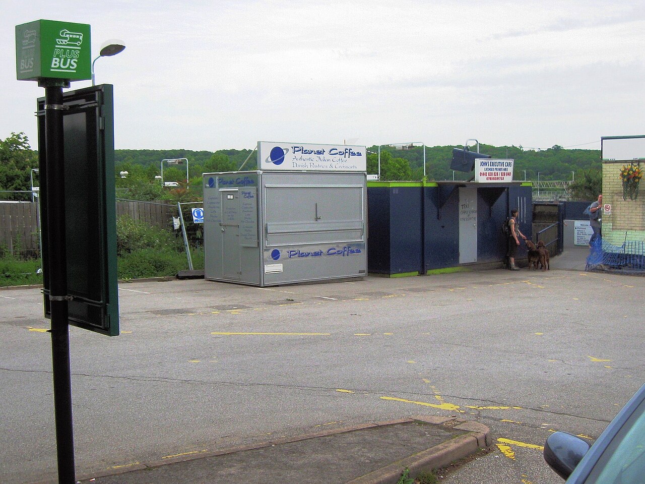 Puerto Rican office coffee station with cafetera and coworkers gathered during break