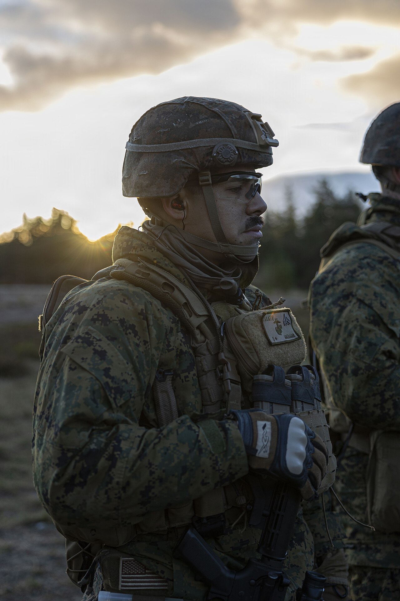 Diverse group of Puerto Rican coffee industry stakeholders meeting to discuss future strategy (Wikimedia: U S Marines participate in Marine Corps Combat Marksmanship Program table 5 to i, Public domain)