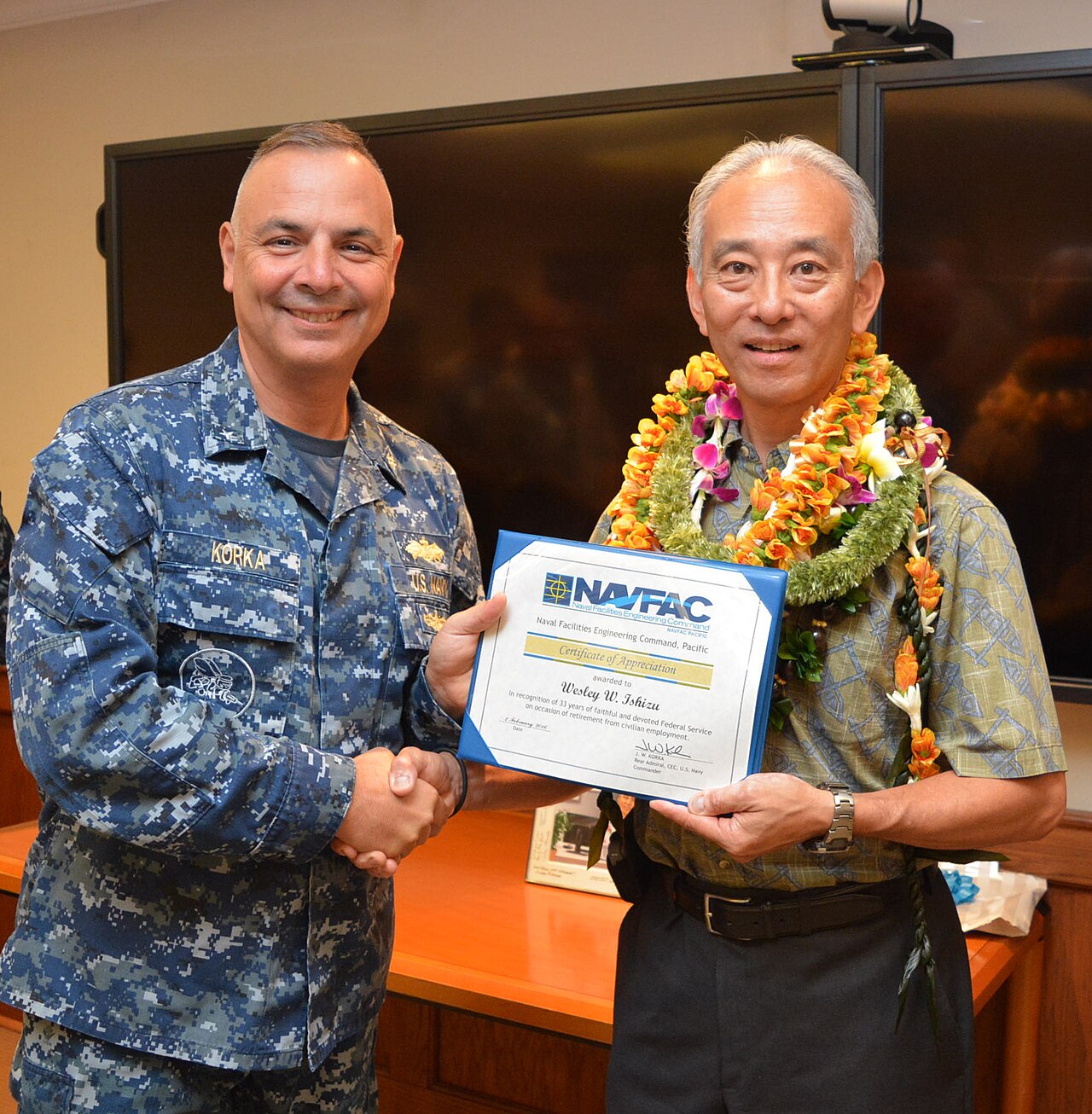 Puerto Rican coffee certification official inspecting a farm for designation compliance