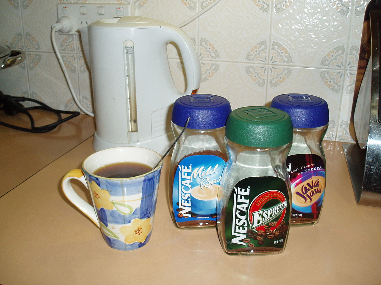 fresh brewed coffee cup steaming morning sunlight on wooden table