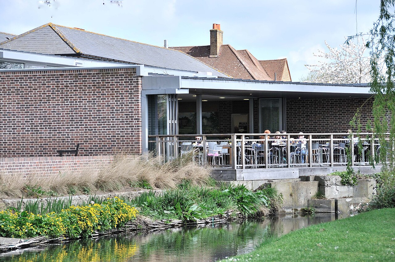 Historic cafe terrace in Old San Juan with coffee service and colonial architecture in background