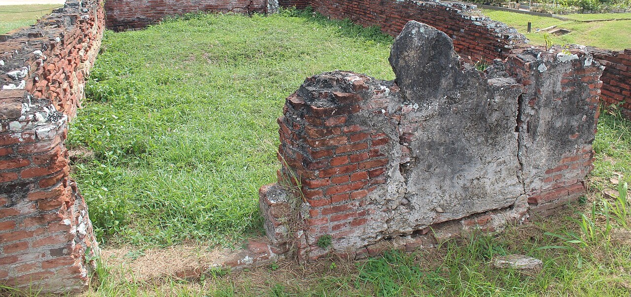 Overgrown foundation walls of a former Puerto Rican hacienda, photographed in recent years