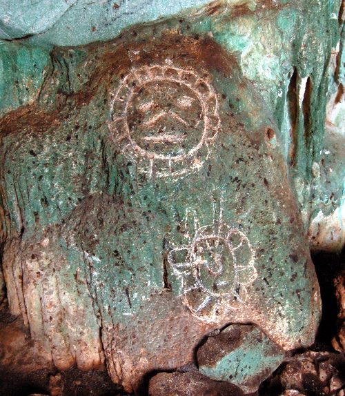 Taino petroglyphs carved into cave rock at Cueva Lucero, Juana Diaz, Puerto Rico