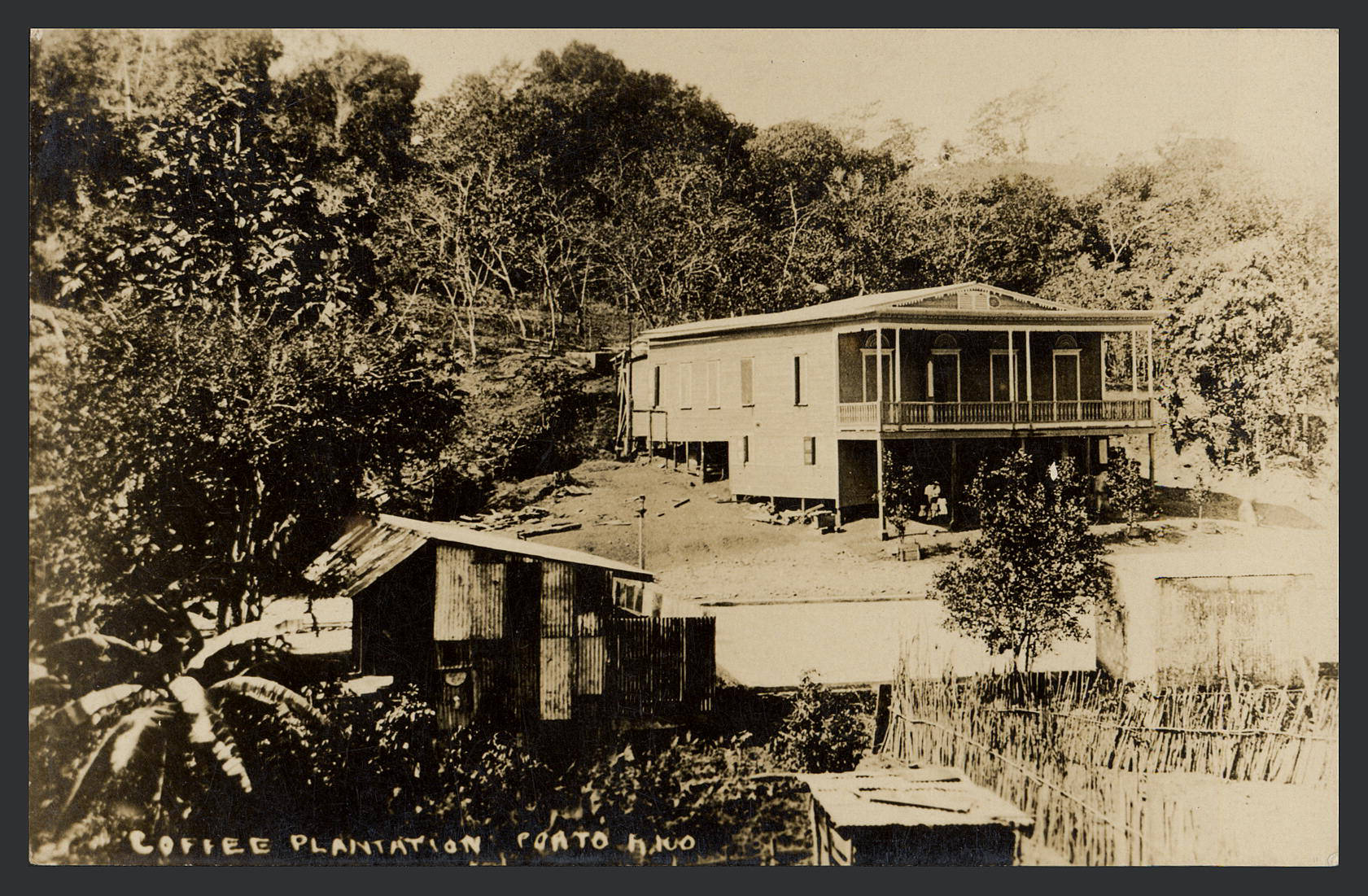 Historic Puerto Rican coffee plantation: hacienda house with drying sheds and sliding-roof drying decks on a mountain slope
